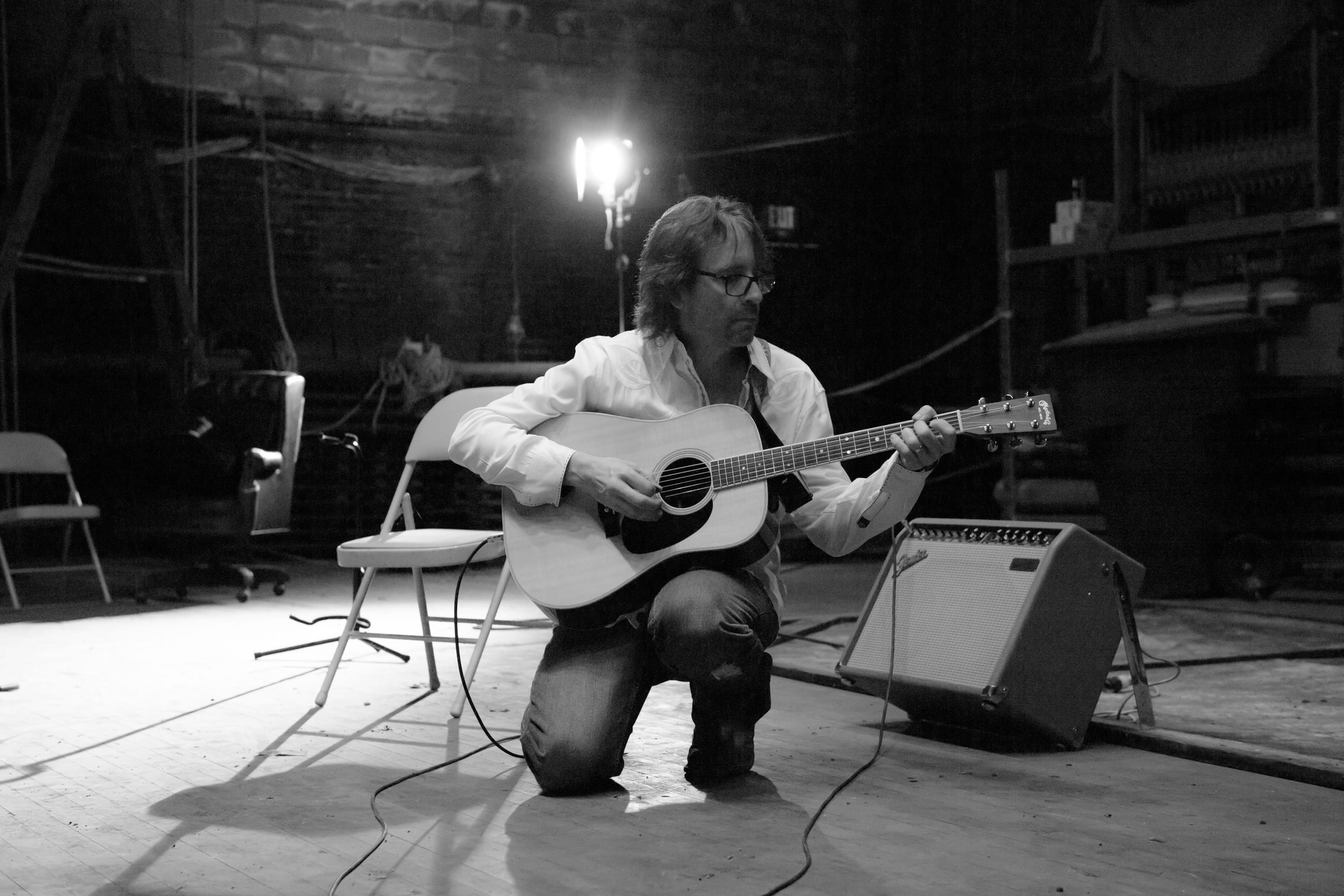John Aulabaugh playing guitar